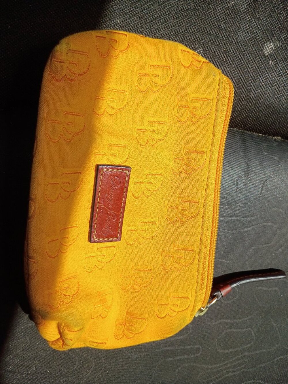 Dooney & Bourke Signature monogram yellow canvas wristlet pouch